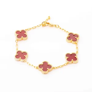 Golden bracelet five roses with maroon stones