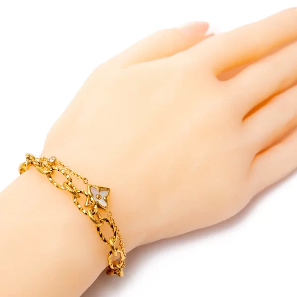 Golden plated two-line bracelet with shell stone