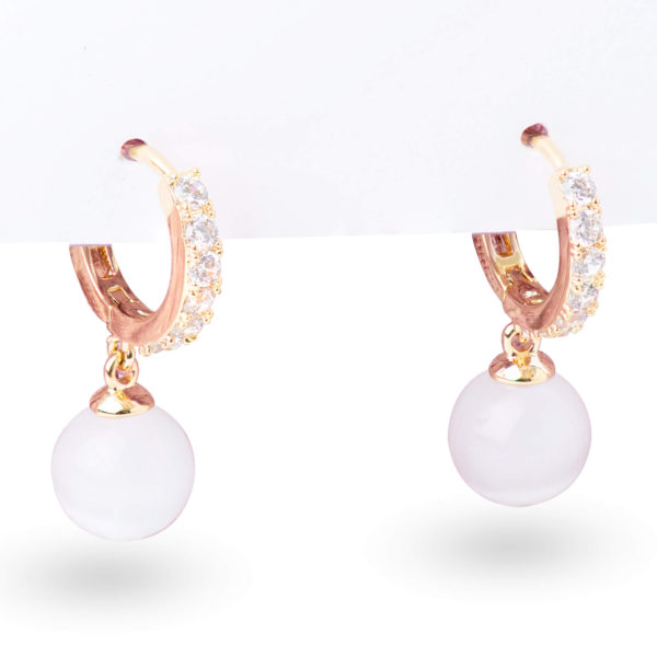 Soft golden earrings inlaid with zircon